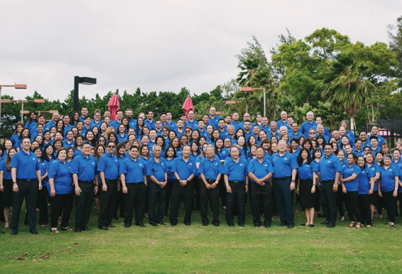 APFCU staff standing outside together in a large group photo